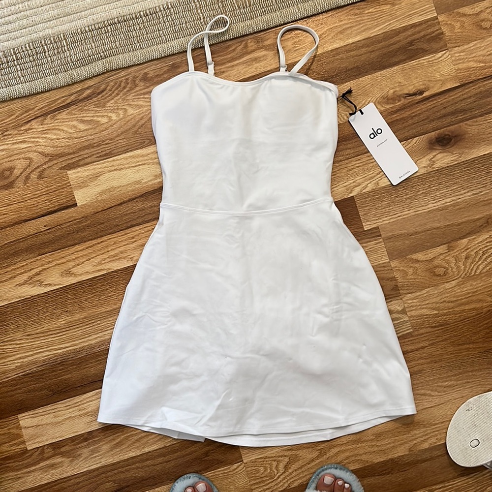Alo skirt short one piece. Cannot return and never worn. Soo cute size xsmall